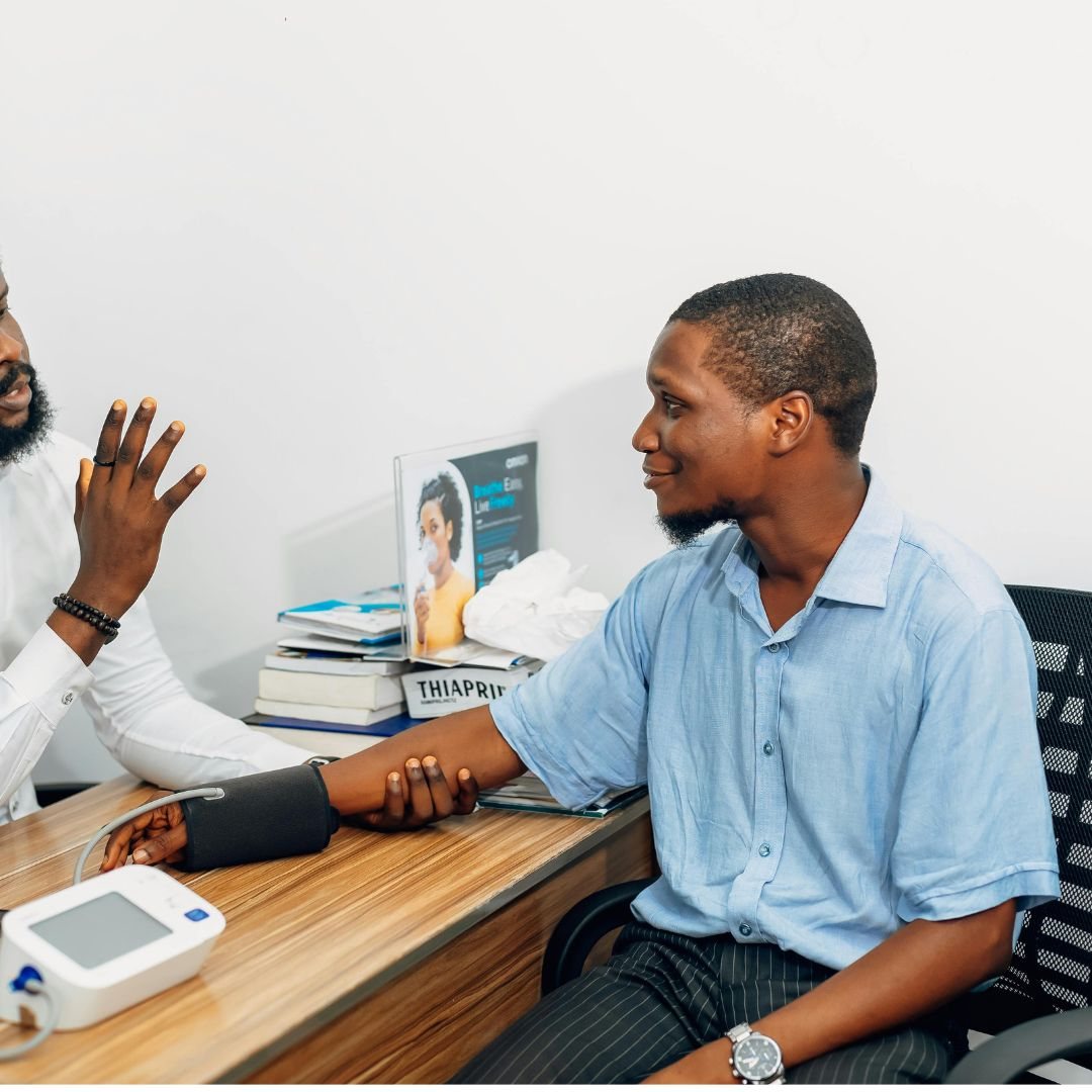 Specialist reassuring a patient during a follow-up consultation